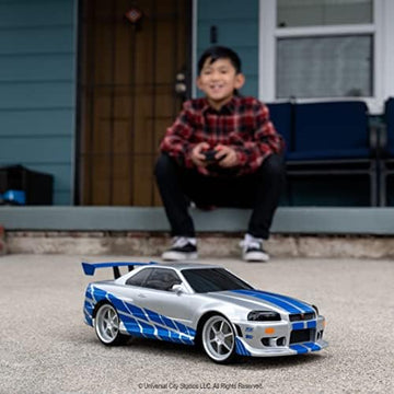 UNO1RC Toys Fast & Furious Brian's Nissan Skyline GT-R (Bnr34)- Ready to Run R/C Radio Control Toy Vehicle, 1: 16 Scale, Silver and Blue, (99370)